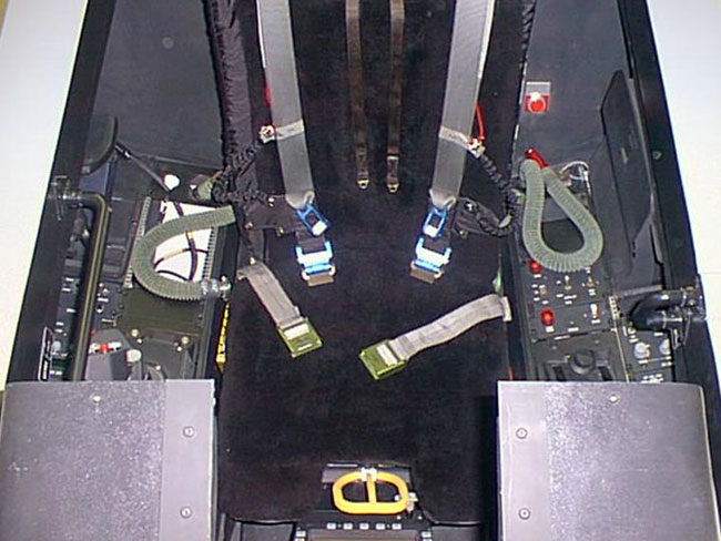 Simulated F-22 ejection seat in cockpit
